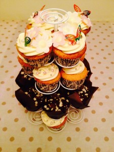 Sharing their birthday celebrations together, with a pretty cupcake tower
