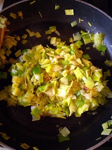 The sautéed leeks have lost their bright colour and shrunk in the pan as they've cooked!