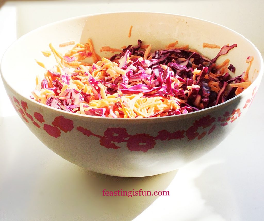Pretty bamboo fibre bowl with decorative flowers around the outside edge, containing a no cook, easy side dish.