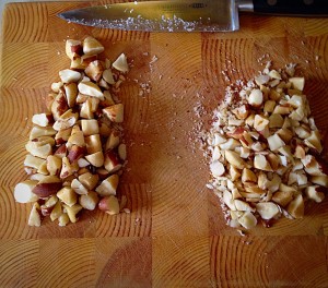 The roughly chopped Brazil nuts, on the left are for the topping. The finer chopped nuts, on the right, are for inside the buns. 