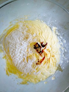 Add the vanilla extract and corn flour and whisk into the butter/sugar mixture.