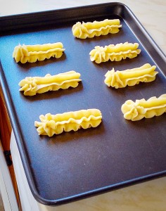 Soo pretty! Keep a piped finger's width between each one as they spread a little whilst baking.