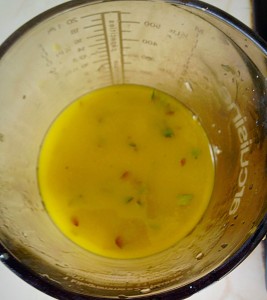 The sauce will emulsify - give a quick whisk again prior to pouring over the vegetables.