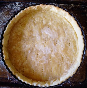 The pastry case is now part baked. This ensures the egg mixture will not seep into the pastry. The quiche will have a crisp bottom, when fully cooked.