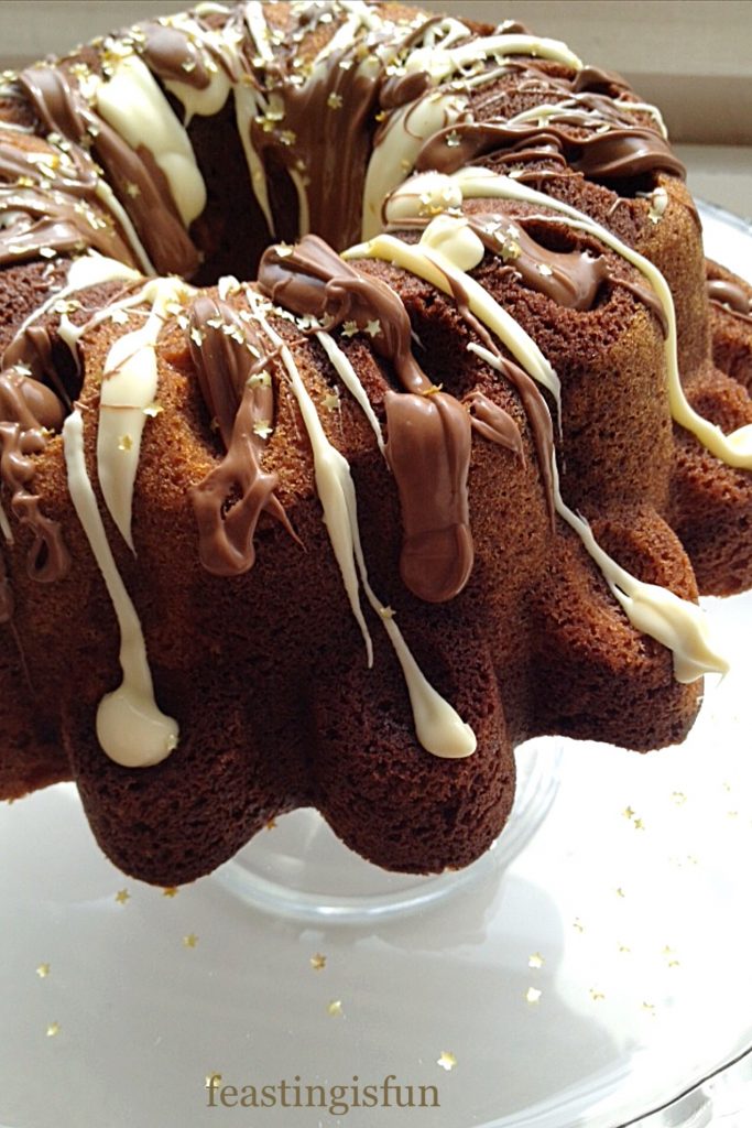 White and milk chocolate drizzled marble cake
