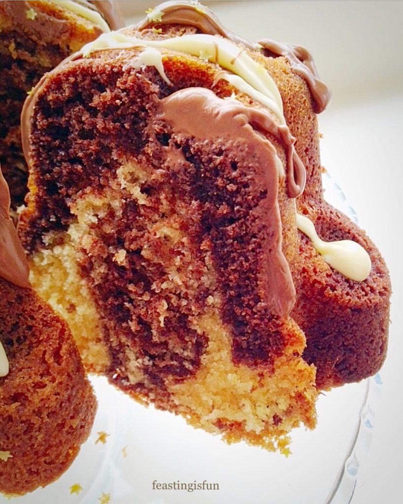 A slice of swirled chocolate and vanilla sponge.