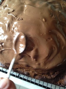 Malted Marbled Chocolate Cake - use a spoon to smooth the melted chocolate over the top of the cake.