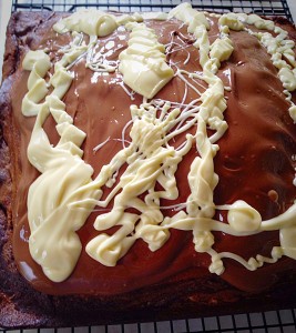 Malted Marbled Chocolate Cake - drizzle the white chocolate on top.