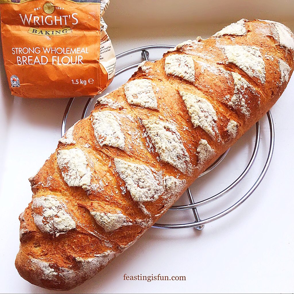 Wholemeal Bloomer bread with criss cross scoring.