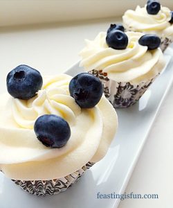 Blueberry topped cupcakes.
