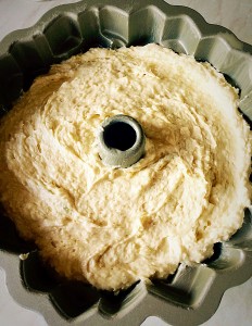 Spoon the cake batter into the Bundt tin. Rap the tin on the work surface a couple of times, this will release any trapped air bubbles