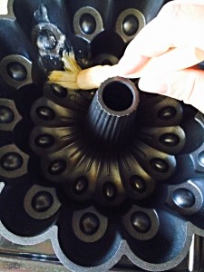 Melt approx 1tbsp of butter and using a pastry brush, ensure the inside of the Bundt tin is completely greased.