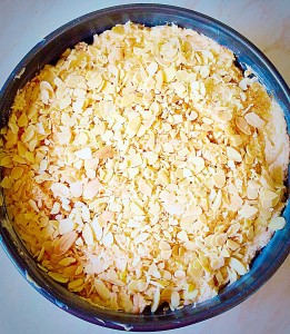 For an extra crunchy topping, cover the cake batter with flaked almonds.