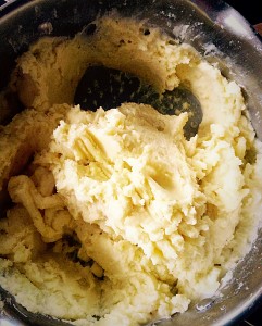 Mash the potatoes, cream and butter until completely smooth.