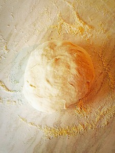 Place the dough onto the prepared worktop