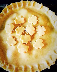 Steak Leek and Ale Pie brush the pastry with egg wash and cut out decorations from the leftover pastry. Place on the pie and brush with egg wash.