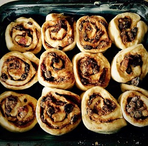 Pack the Chelsea Buns into a buttered pan.