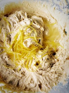 Add the zest of the whole lemon and half of its juice to the batter.