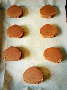 Place the uncooked cookies onto a parchment paper lined baking sheet, allowing room for expansion between each cookie.