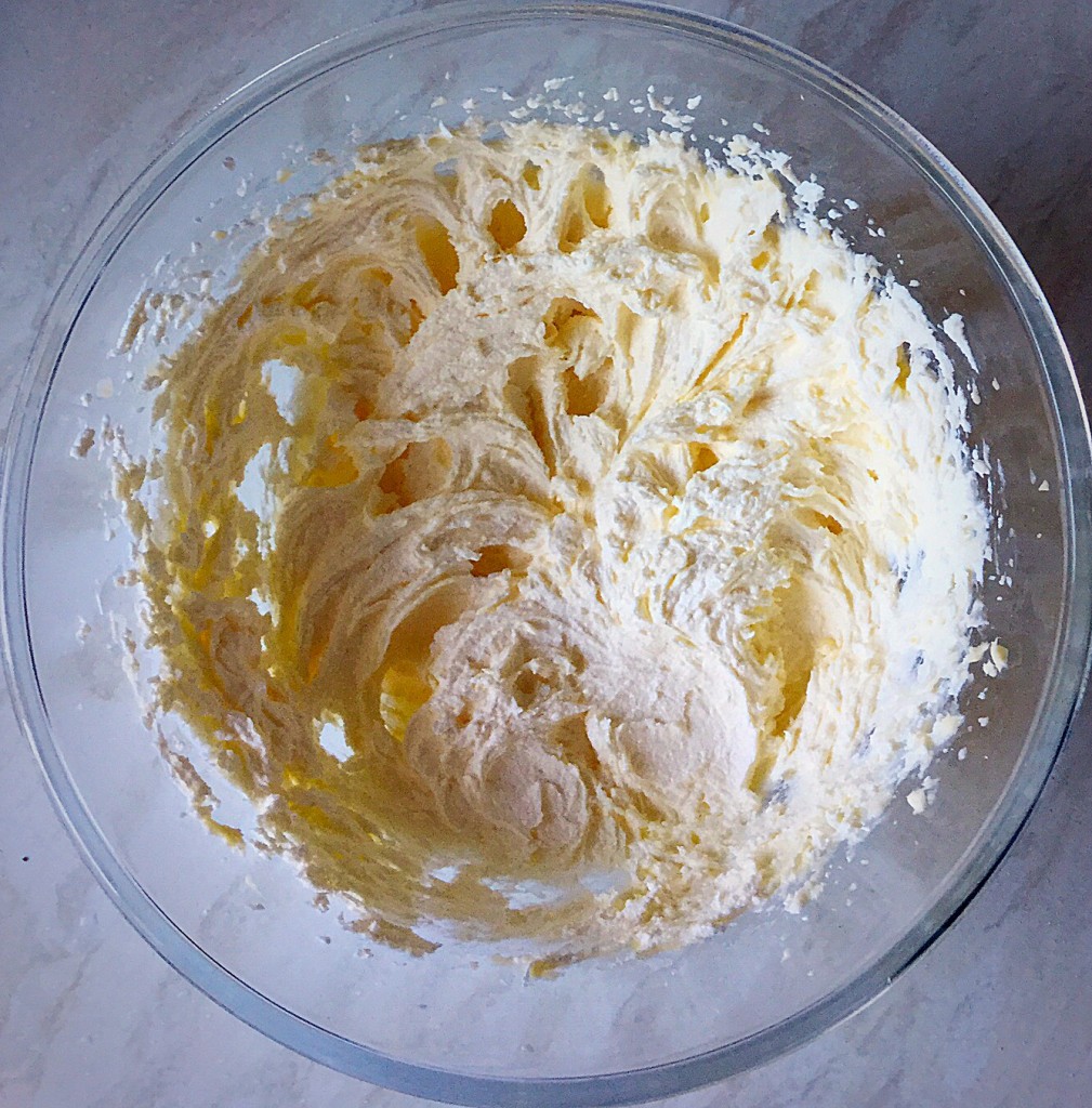 Whisk the sugar and butter together until pale and creamy.