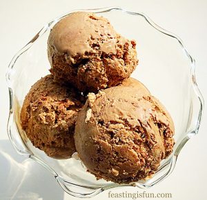 Chocolate orange ice cream scoops in a bowl.