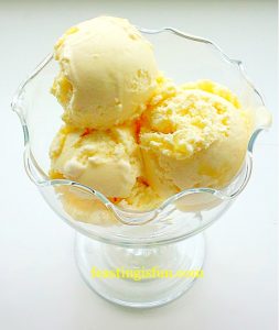 Lemon Ripple Ice Cream scoops served in a glass bowl.
