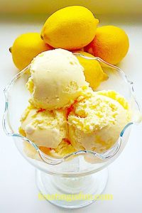 Lemon Ripple Ice Cream scoops in a bowl.