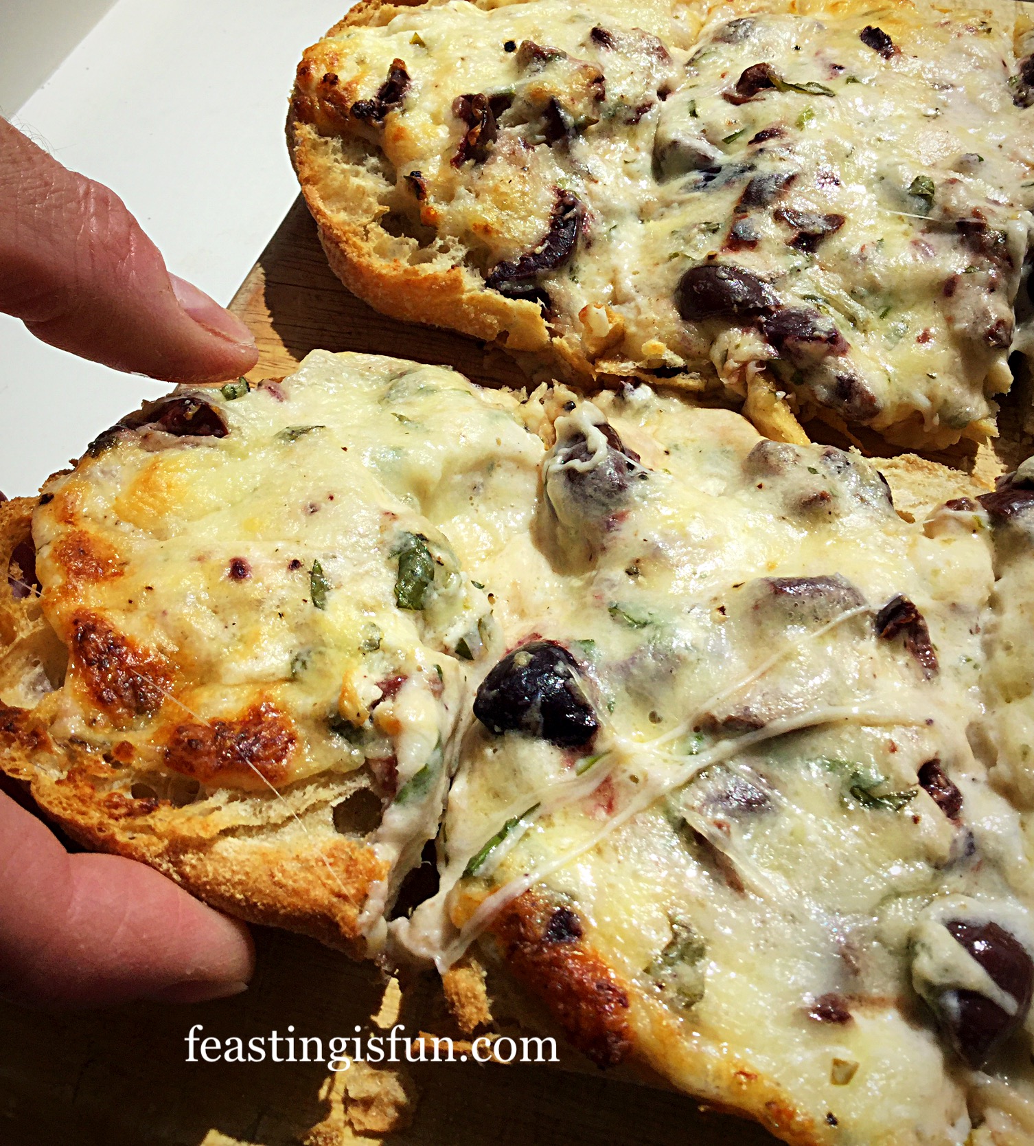 Baked Cheese Olive Ciabatta Bread - Feasting Is Fun