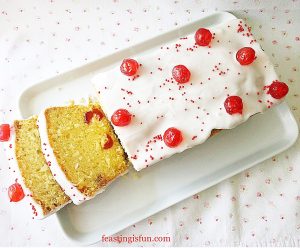 Iced cherry coconut loaf cake.