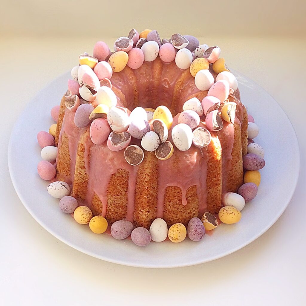 Easter Bundt Cake decorated with Cadbury’s mini eggs.